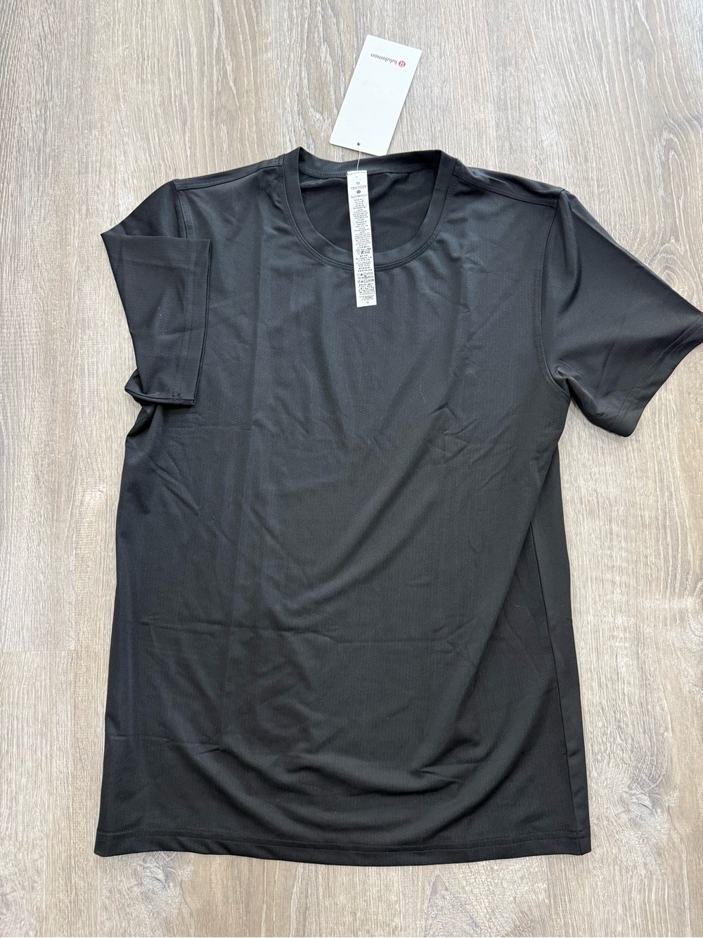 NEW Black Short Sleeve Athletic Tee with Fake Lululemon Tagging